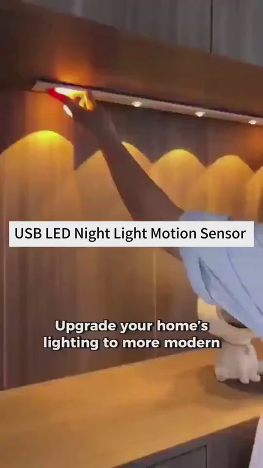 Motion sensor LED light installed underneath a kitchen cabinet